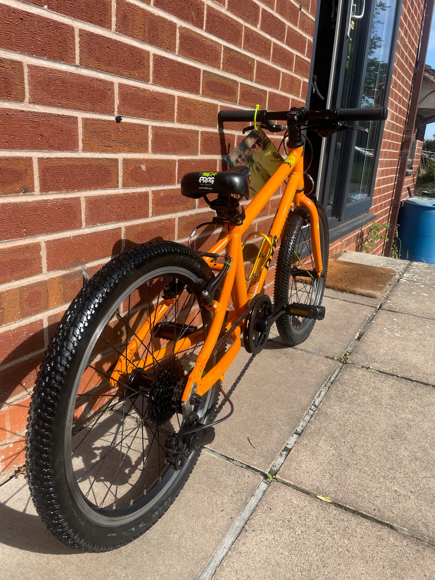 A Pre Loved Frog Bike For Sale, Orange Frog 55 lightweight children’s bicycle, 20” wheels, 8 speed, V brakes, nationwide delivery is available.