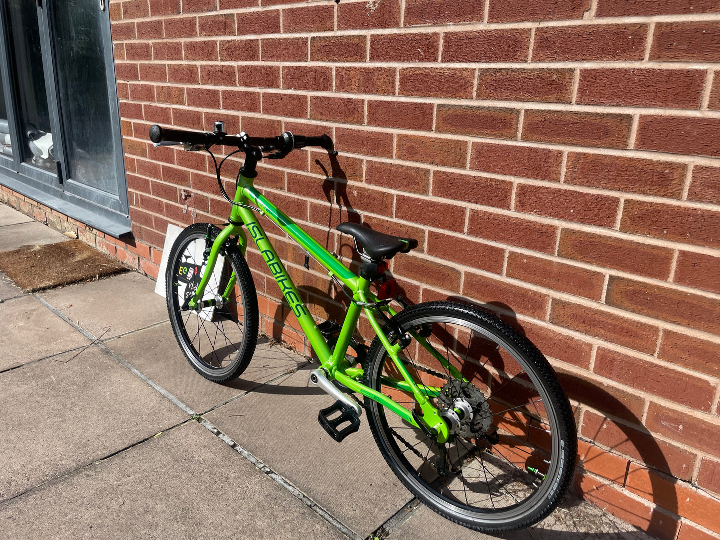 A Pre Loved Isla Bike, Green Isla Beinn 20L lightweight children’s bicycle, 20” wheels, 8 speed, V brakes, nationwide delivery is available.