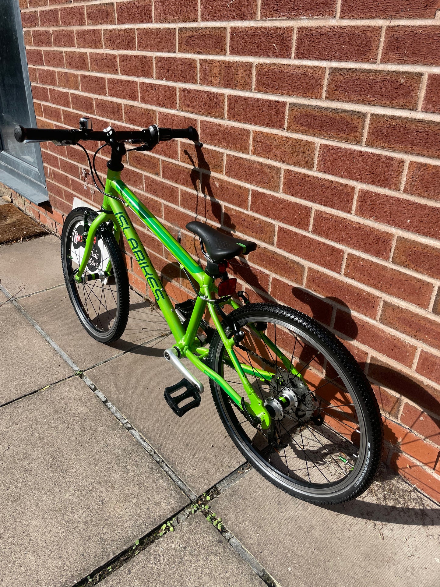 A Pre Loved Isla Bike, Green Isla Beinn 20L lightweight children’s bicycle, 20” wheels, 8 speed, V brakes, nationwide delivery is available.