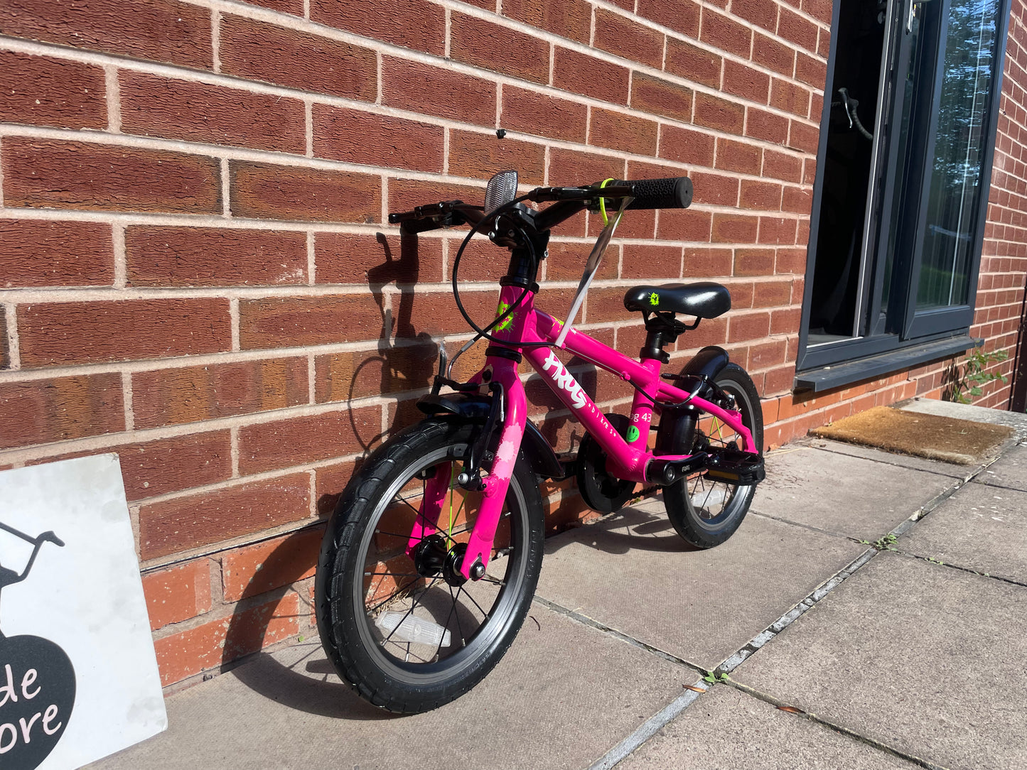A Pre Loved Frog Bike For Sale, Pink Frog 43 first pedal bike, 14” wheels lightweight children’s bicycle, V brakes, padded seat, can be used as a balance bike, excellent condition, nationwide delivery is available.