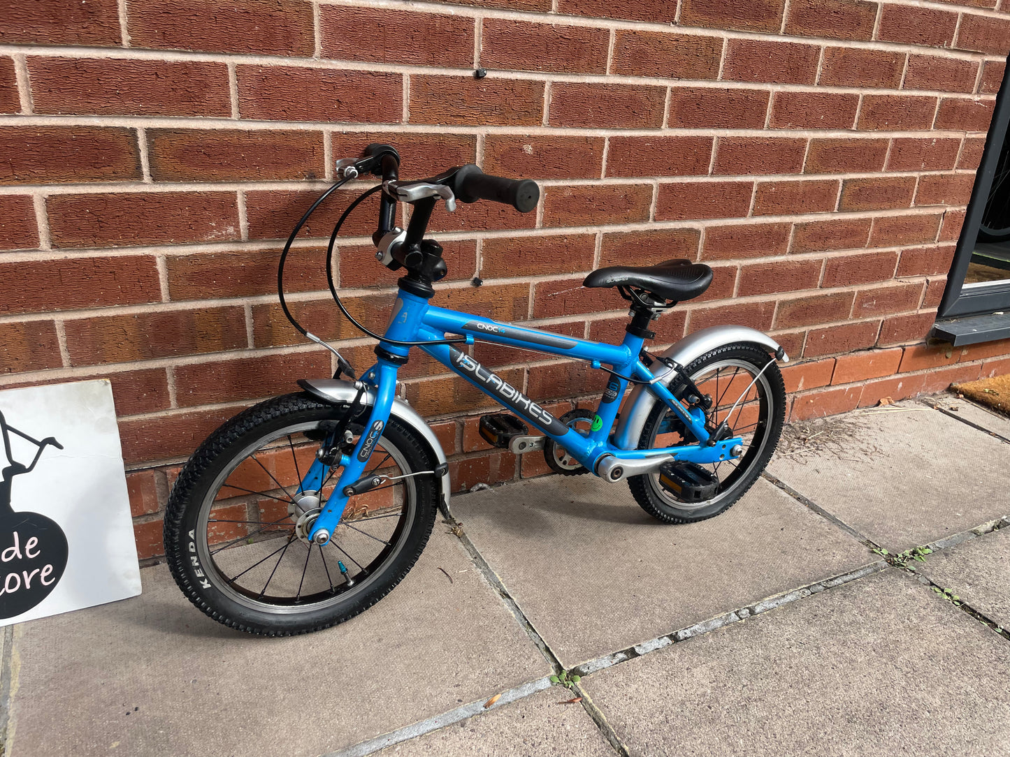 A Pre Loved Isla Cnoc 14 first pedal bike For Sale, Blue, 14” wheels, V brakes, mudguards, very lightweight, nationwide delivery is available.