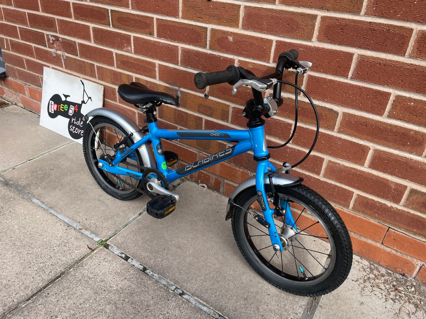A Pre Loved Isla Cnoc 14 first pedal bike For Sale, Blue, 14” wheels, V brakes, mudguards, very lightweight, nationwide delivery is available.