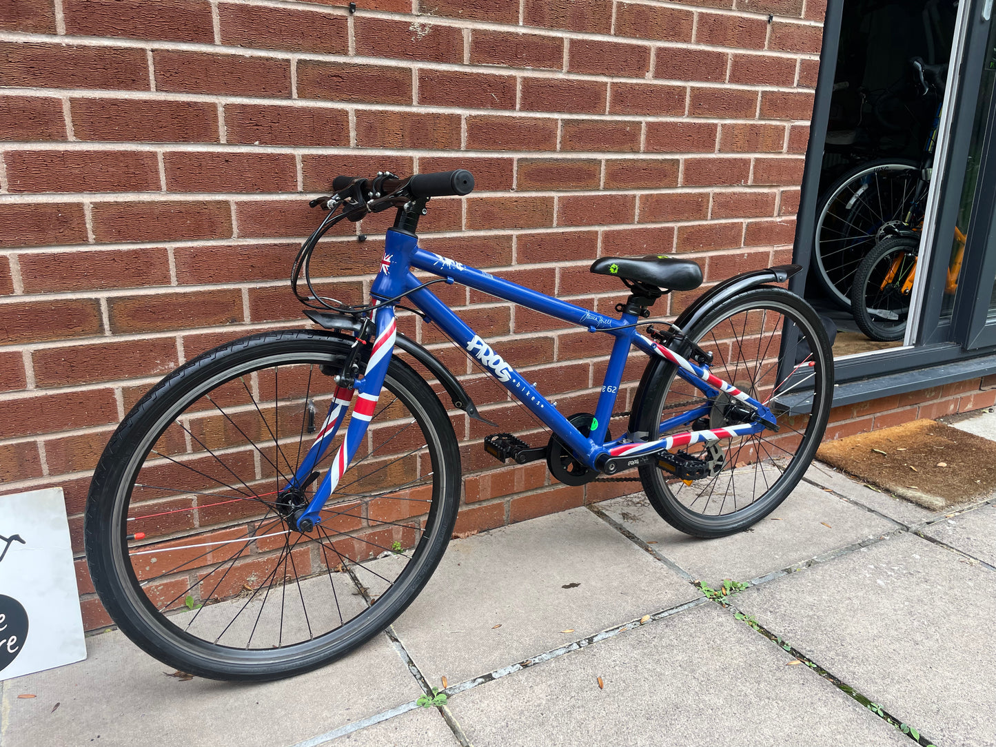 A Pre Loved Frog Bike For Sale, Blue Frog 62, 24” wheels, 8 speed, V brakes, mudguards, very lightweight, nationwide delivery is available.