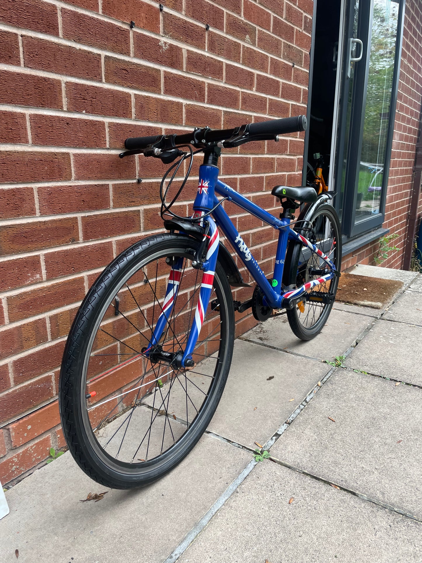 A Pre Loved Frog Bike For Sale, Blue Frog 62, 24” wheels, 8 speed, V brakes, mudguards, very lightweight, nationwide delivery is available.