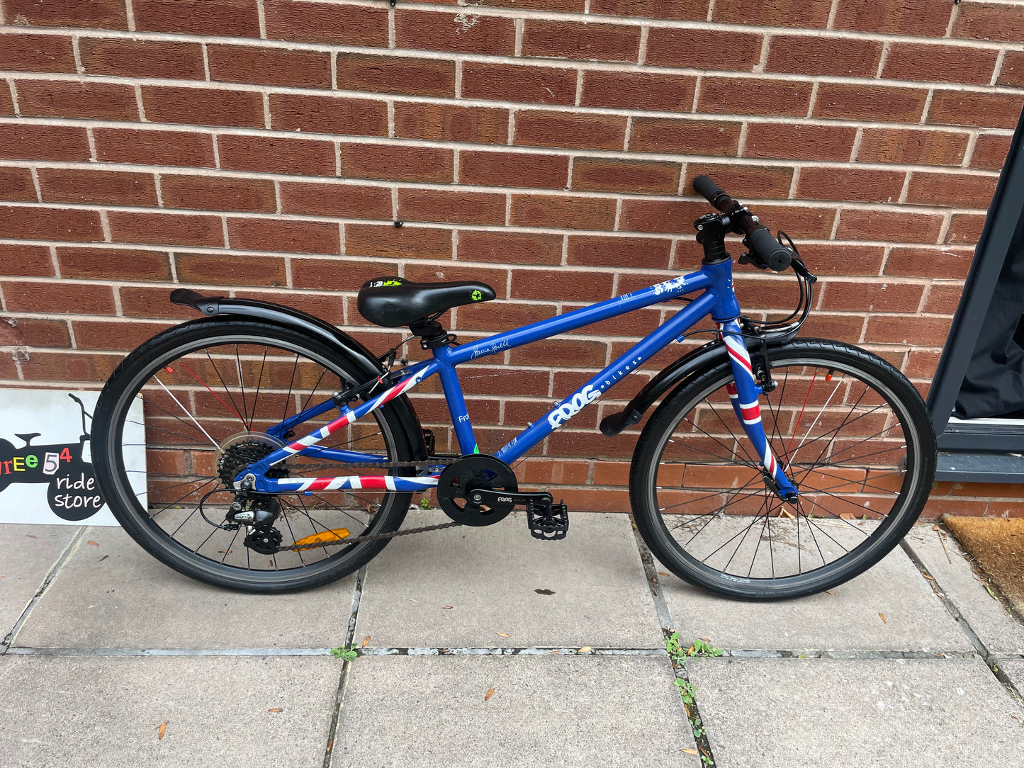A Pre Loved Frog Bike For Sale, Blue Frog 62, 24” wheels, 8 speed, V brakes, mudguards, very lightweight, nationwide delivery is available.