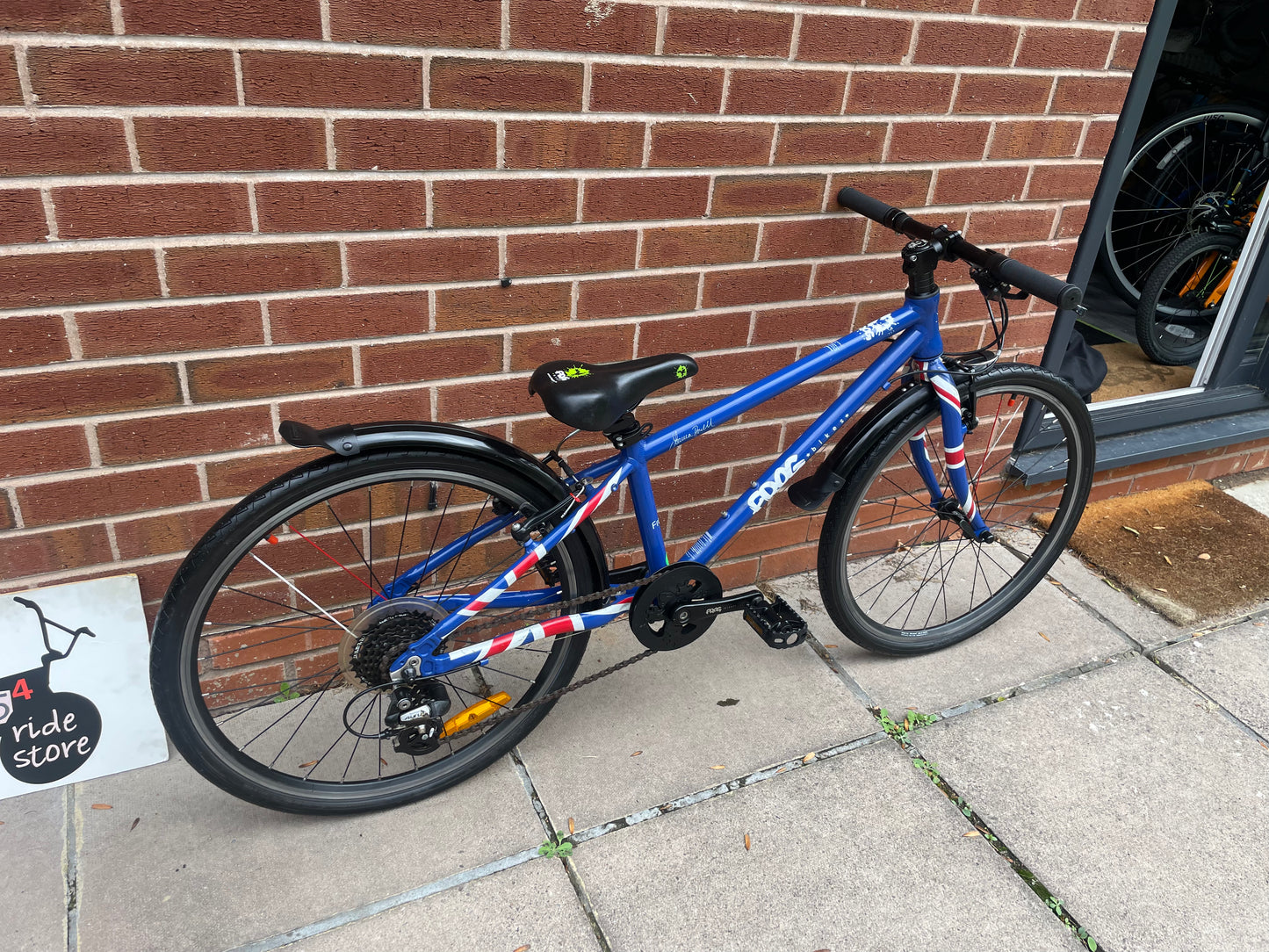 A Pre Loved Frog Bike For Sale, Blue Frog 62, 24” wheels, 8 speed, V brakes, mudguards, very lightweight, nationwide delivery is available.