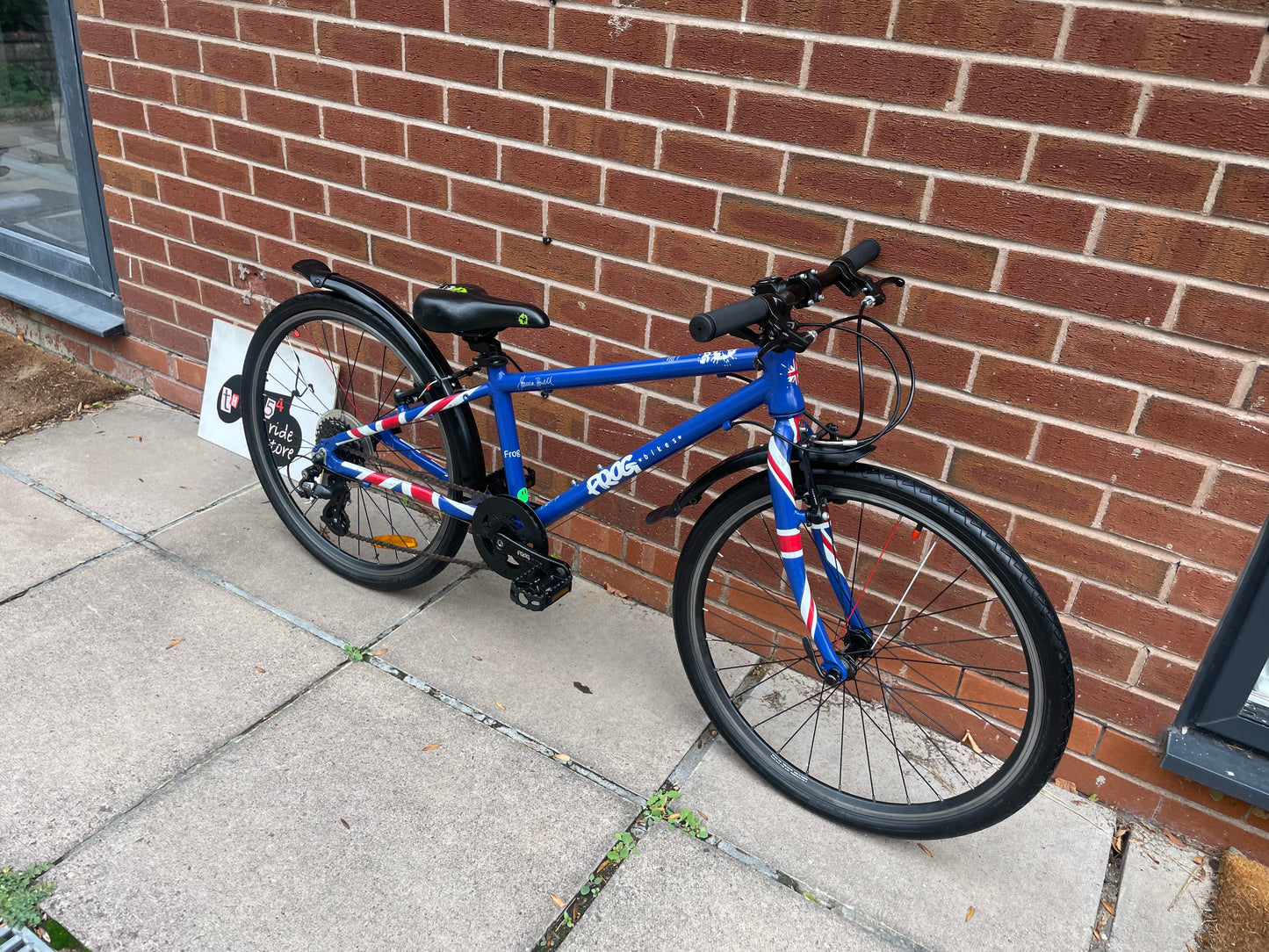 A Pre Loved Frog Bike For Sale, Blue Frog 62, 24” wheels, 8 speed, V brakes, mudguards, very lightweight, nationwide delivery is available.