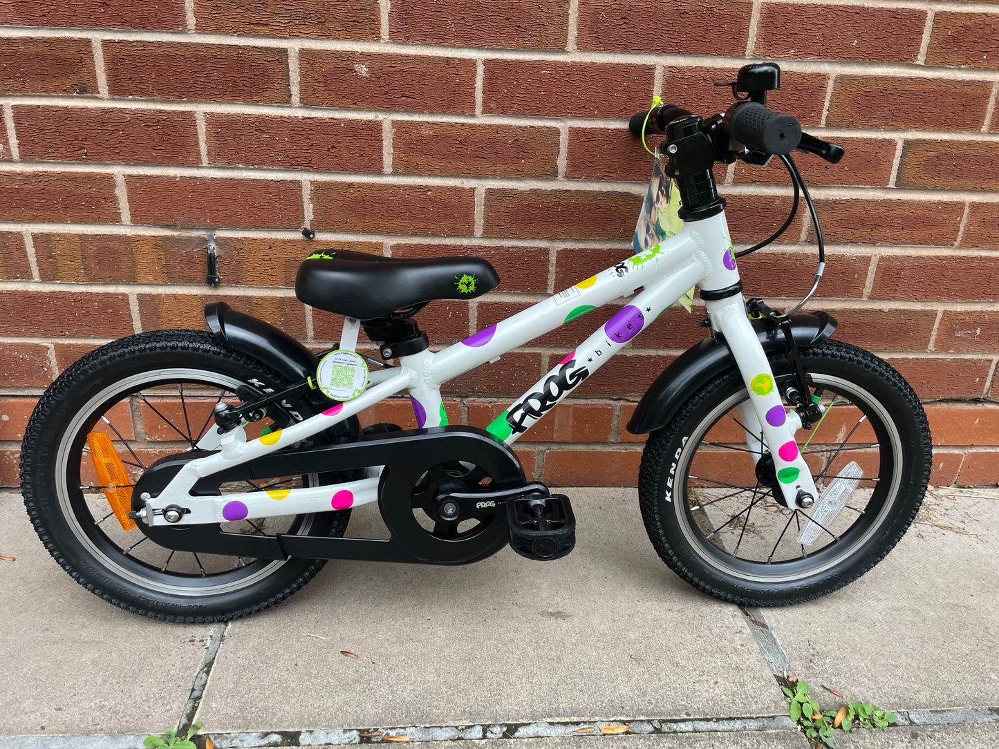 A Pre Loved Frog Bike For Sale, White Spotty Frog 40 first pedal bike, 14” wheels, single speed, padded seat, V brakes, fully enclosed chain, mudguards, nationwide delivery is available.