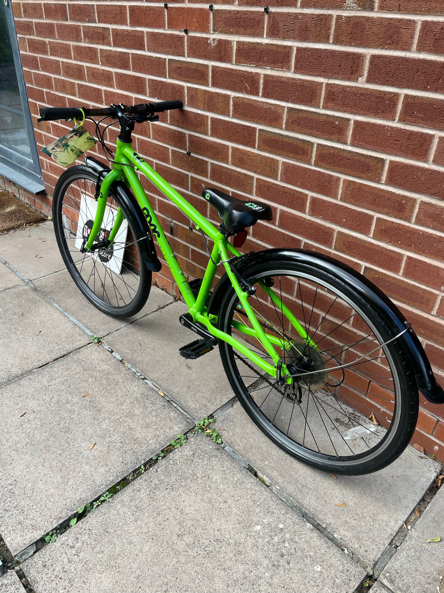 A Pre Loved Frog Bike For Sale, Green Frog 69 26” wheel hybrid bike, 8 speed, V brakes, mudguards, very lightweight, excellent condition, nationwide delivery is available.