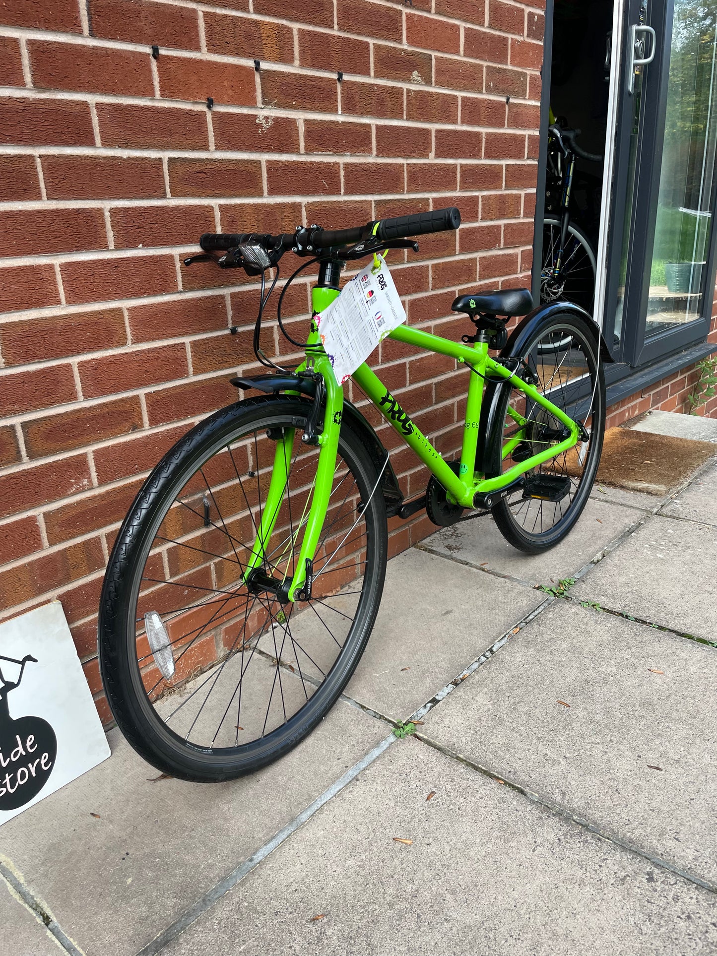 A Pre Loved Frog Bike For Sale, Green Frog 69 26” wheel hybrid bike, 8 speed, V brakes, mudguards, very lightweight, excellent condition, nationwide delivery is available.