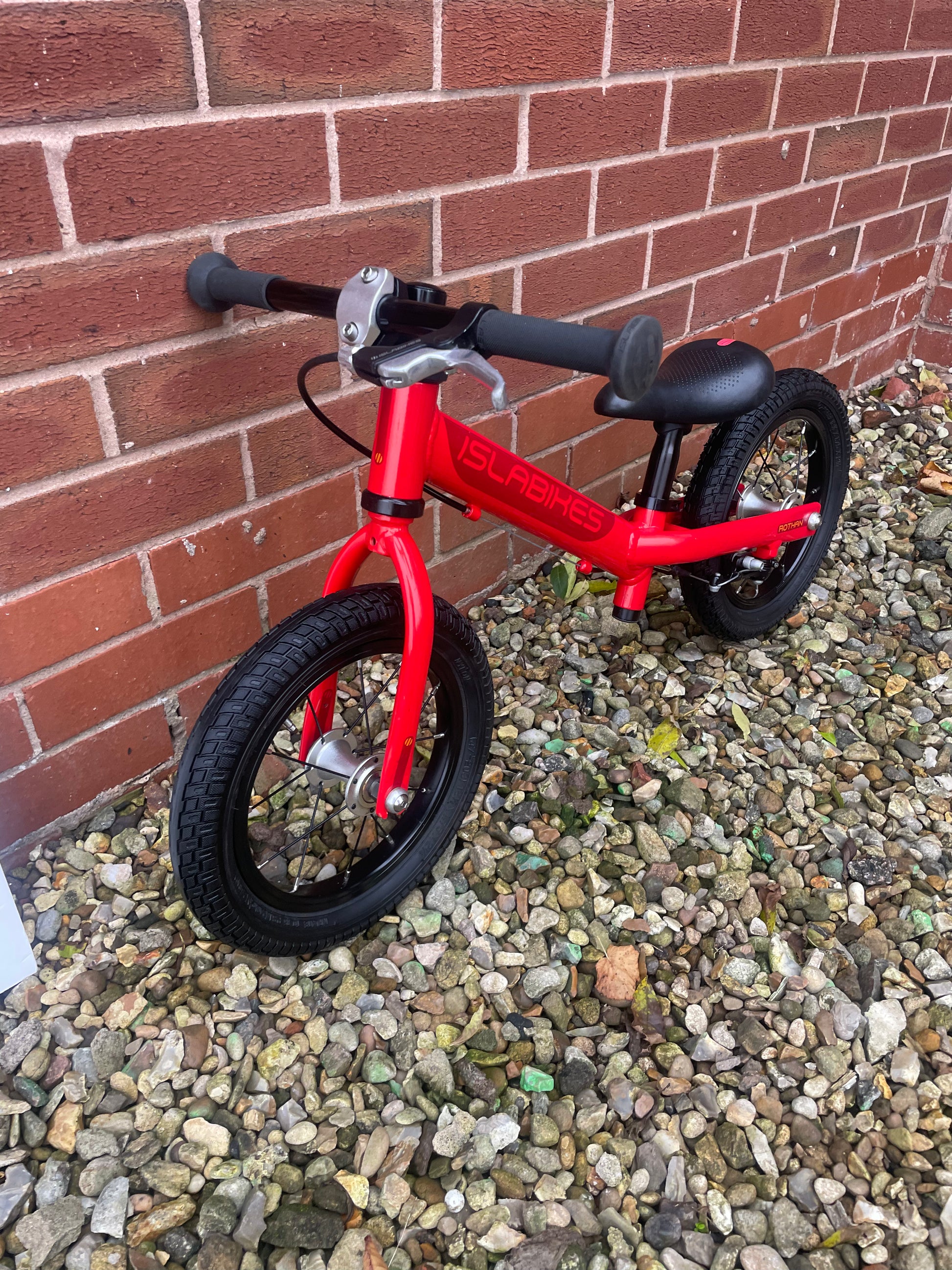 A New ex display Isla Rothan balance bike For Sale red V brake padd Three54 ride store