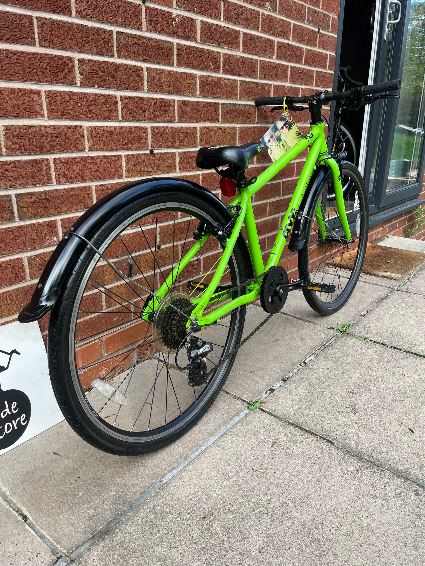 A Pre Loved Frog Bike For Sale, Green Frog 69 26” wheel hybrid bike, 8 speed, V brakes, mudguards, very lightweight, excellent condition, nationwide delivery is available.