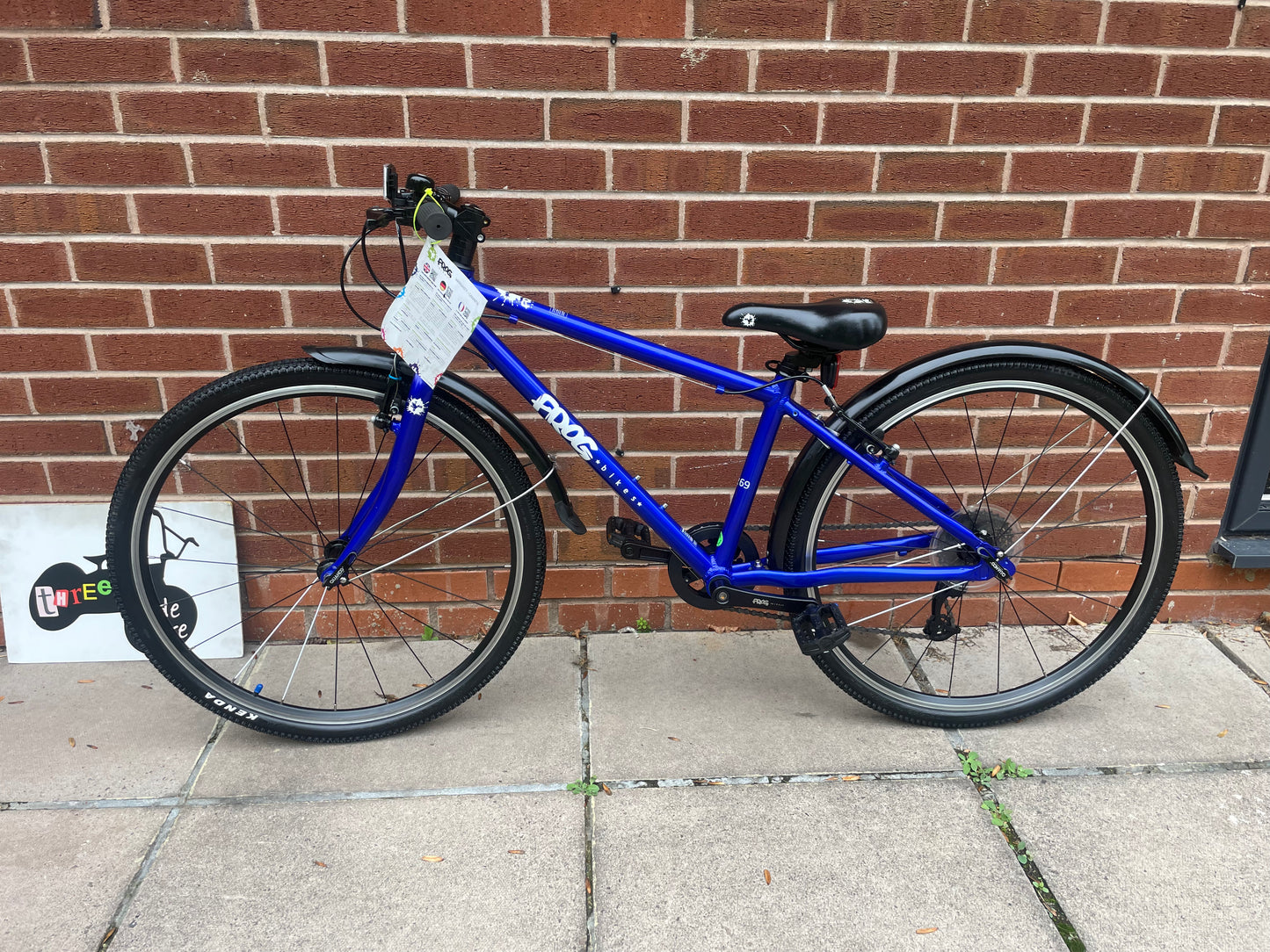 A Pre Loved Frog Bike For Sale, Electric Blue Frog 69, 26” wheels, 8 speed, V brakes, mudguards, very lightweight, nationwide delivery is available.