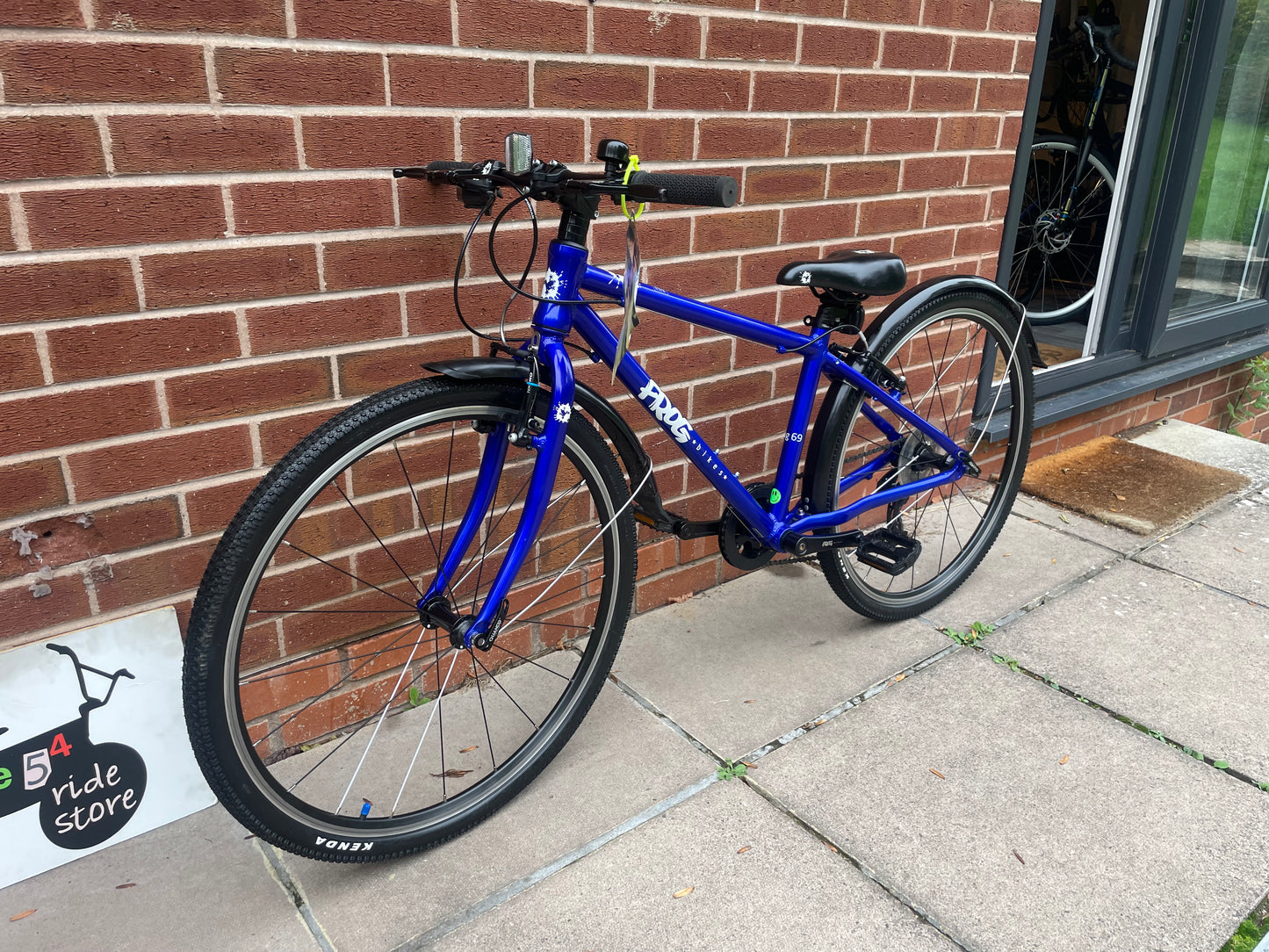 A Pre Loved Frog Bike For Sale, Electric Blue Frog 69, 26” wheels, 8 speed, V brakes, mudguards, very lightweight, nationwide delivery is available.