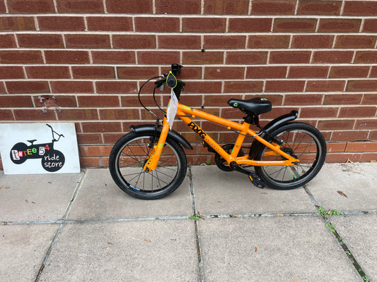 A Pre Loved Frog Bike For Sale, Orange Frog 48 first pedal bike, lightweight, 16” wheels, mudguards, V brakes, nationwide delivery is available.