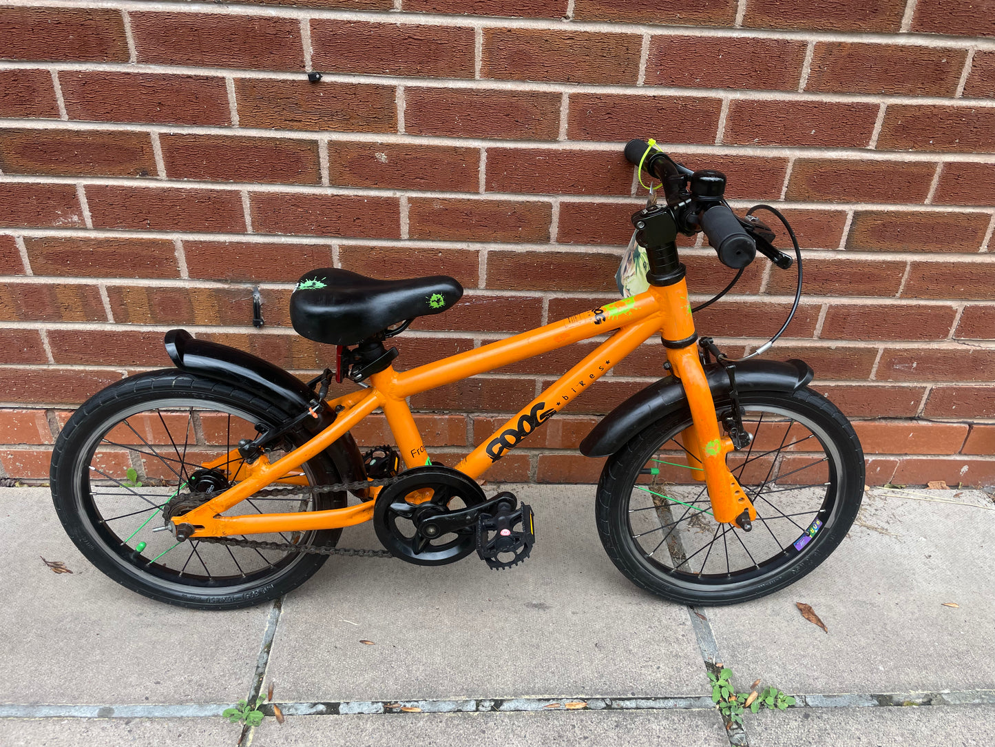 A Pre Loved Frog Bike For Sale, Orange Frog 48 first pedal bike, lightweight, 16” wheels, mudguards, V brakes, nationwide delivery is available.