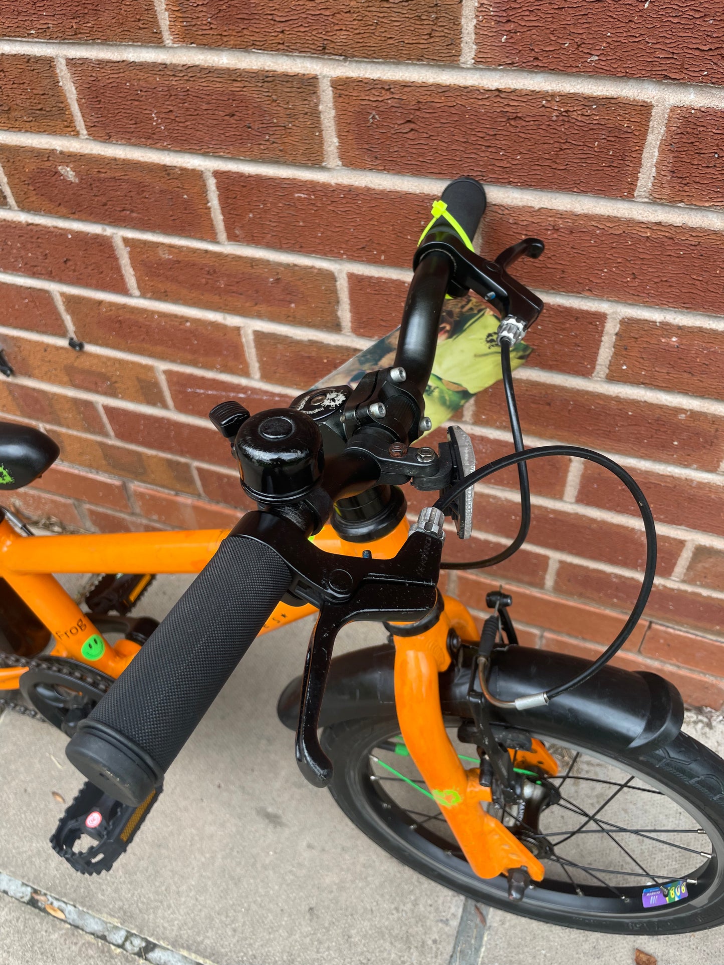 A Pre Loved Frog Bike For Sale, Orange Frog 48 first pedal bike, lightweight, 16” wheels, mudguards, V brakes, nationwide delivery is available.
