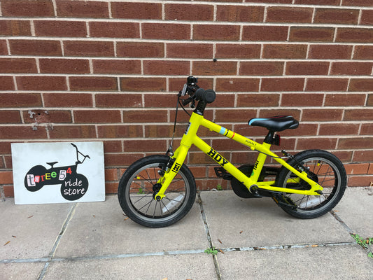 A Pre Loved Hoy Bonaly 14” first pedal bike For Sale, bright yellow, padded seat, V brakes, fully enclosed chain, nationwide delivery is available.