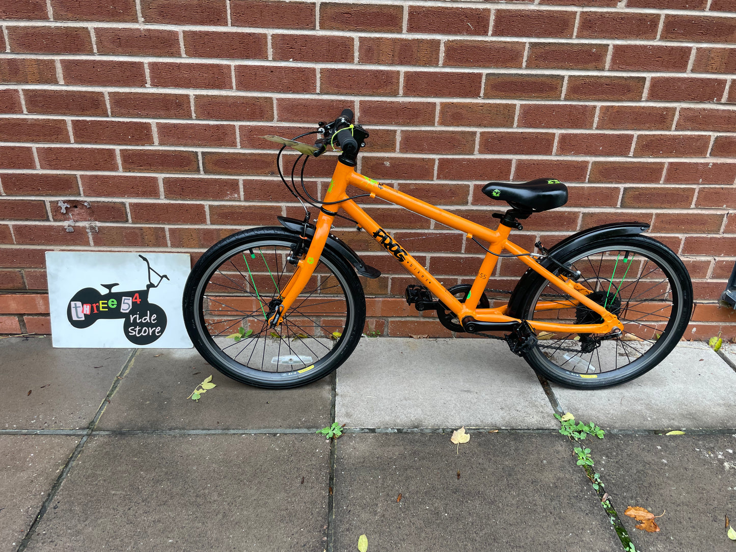 A Pre Loved Frog Bike For Sale, Orange Frog 55, 20” wheels, 8 speed, V brakes, mudguards, very lightweight, nationwide delivery is available.
