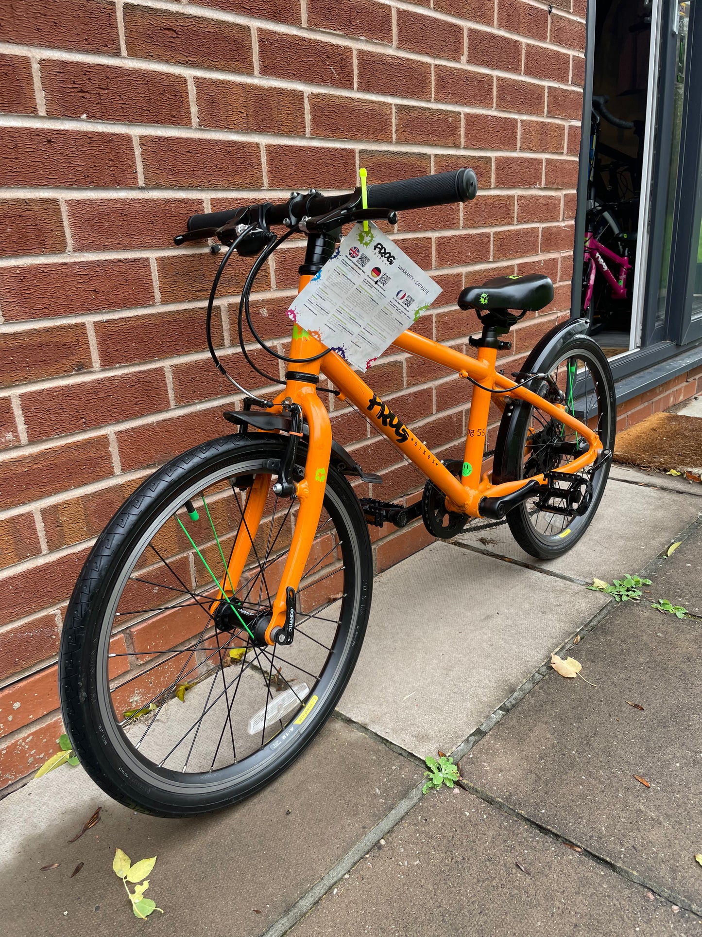A Pre Loved Frog Bike For Sale, Orange Frog 55, 20” wheels, 8 speed, V brakes, mudguards, very lightweight, nationwide delivery is available.