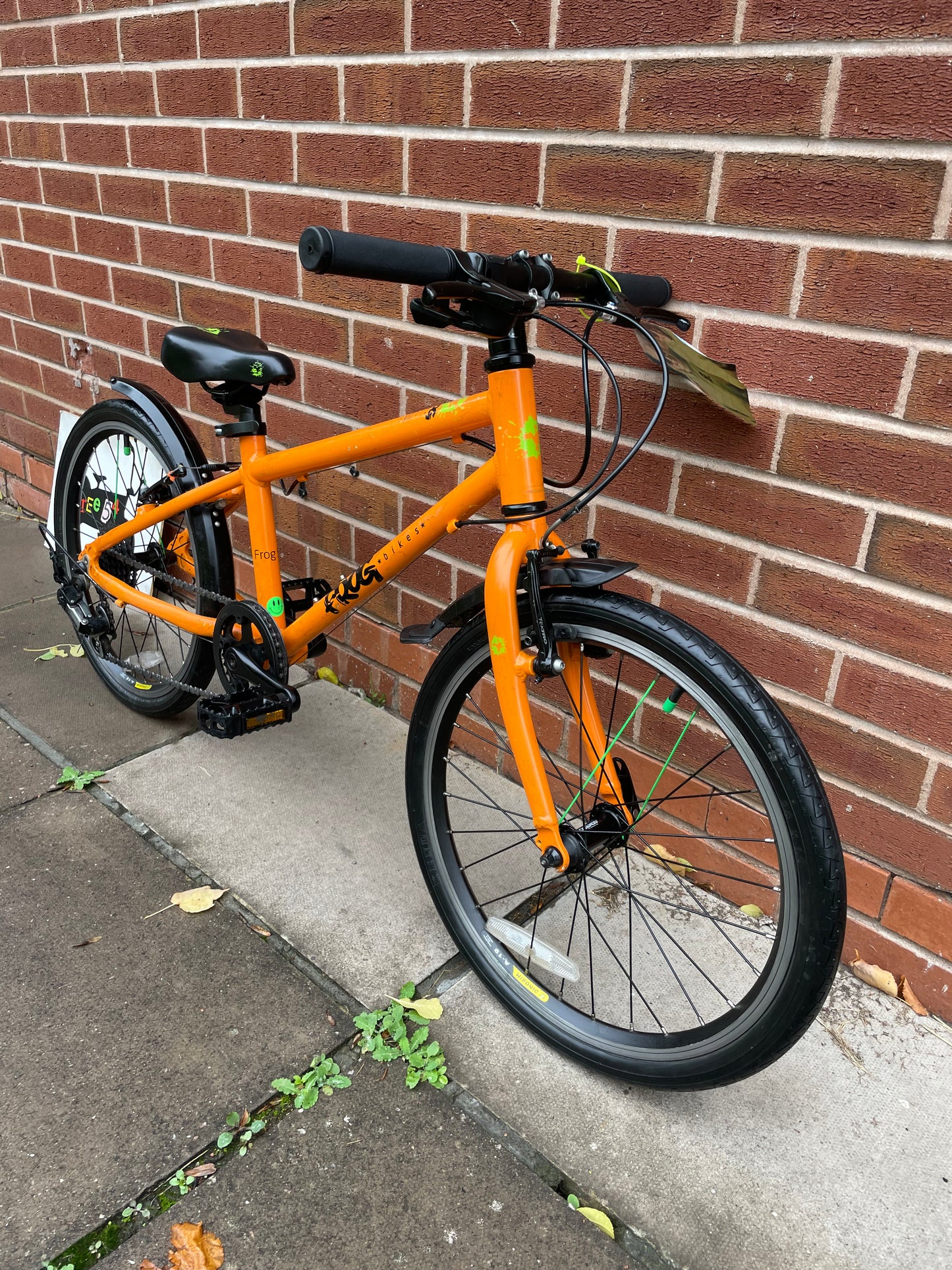 A Pre Loved Frog Bike For Sale, Orange Frog 55, 20” wheels, 8 speed, V brakes, mudguards, very lightweight, nationwide delivery is available.