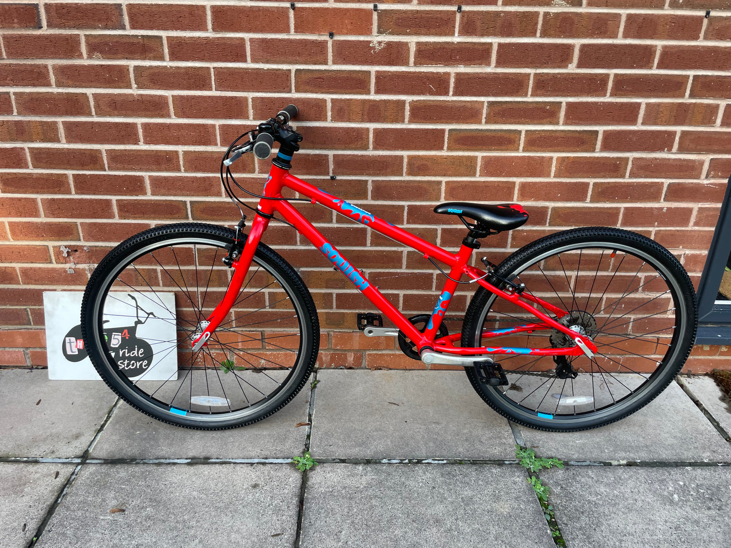 A Pre Loved Squish Bike For Sale, Red, 26” wheels, 8 speed, V brakes, very lightweight children’s bicycle, nationwide delivery is available.