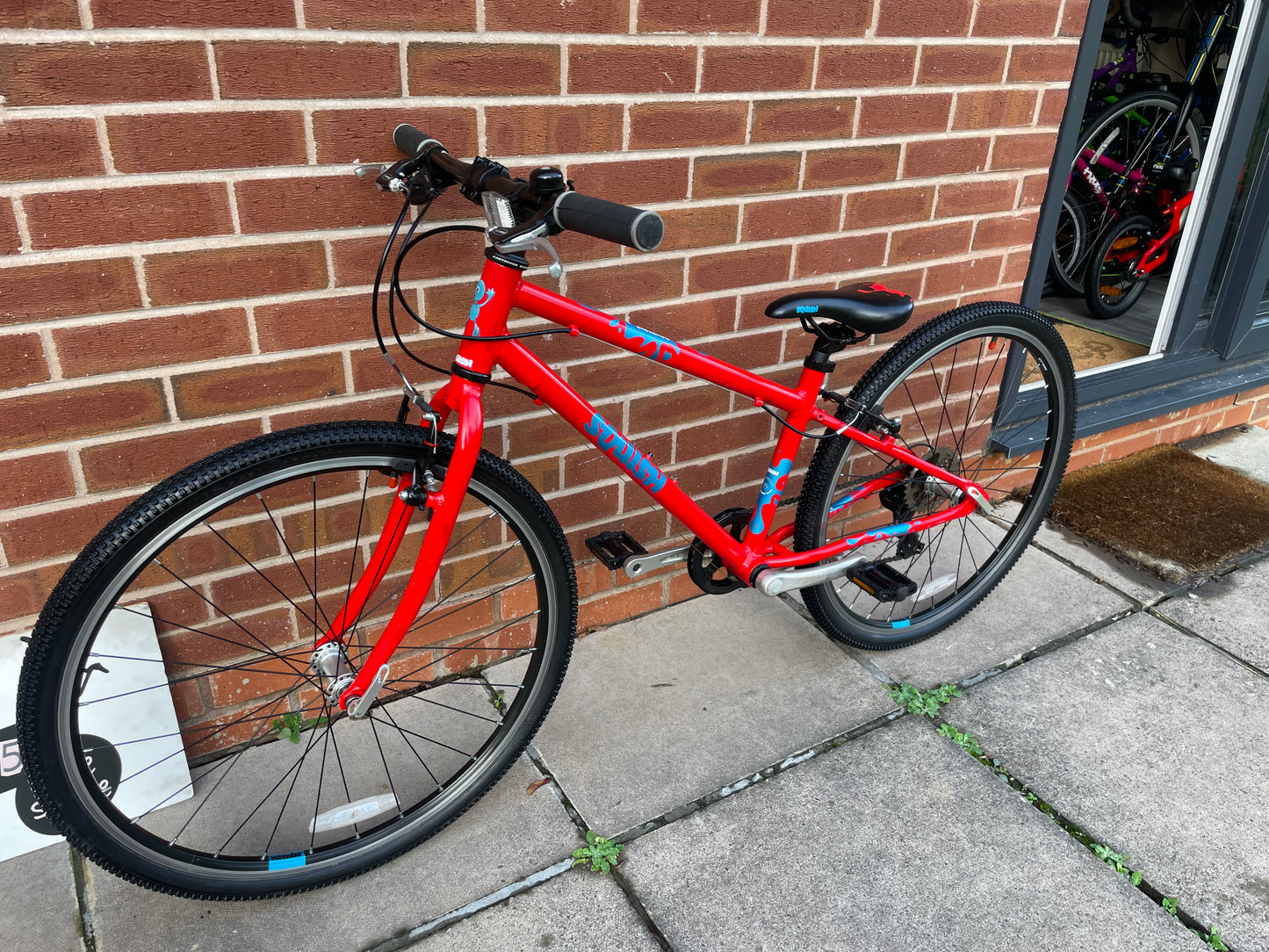 A Pre Loved Squish Bike For Sale, Red, 26” wheels, 8 speed, V brakes, very lightweight children’s bicycle, nationwide delivery is available.