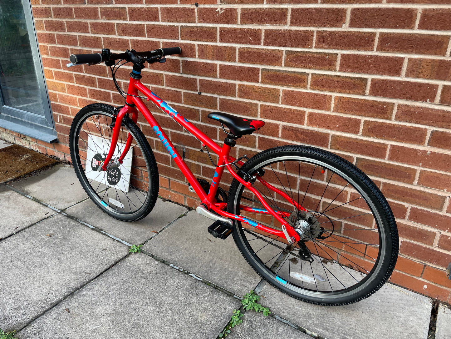 A Pre Loved Squish Bike For Sale, Red, 26” wheels, 8 speed, V brakes, very lightweight children’s bicycle, nationwide delivery is available.
