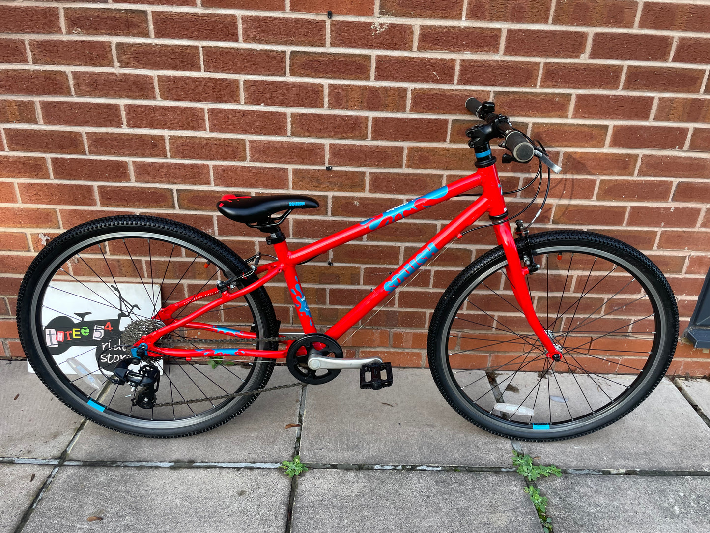 A Pre Loved Squish Bike For Sale, Red, 26” wheels, 8 speed, V brakes, very lightweight children’s bicycle, nationwide delivery is available.