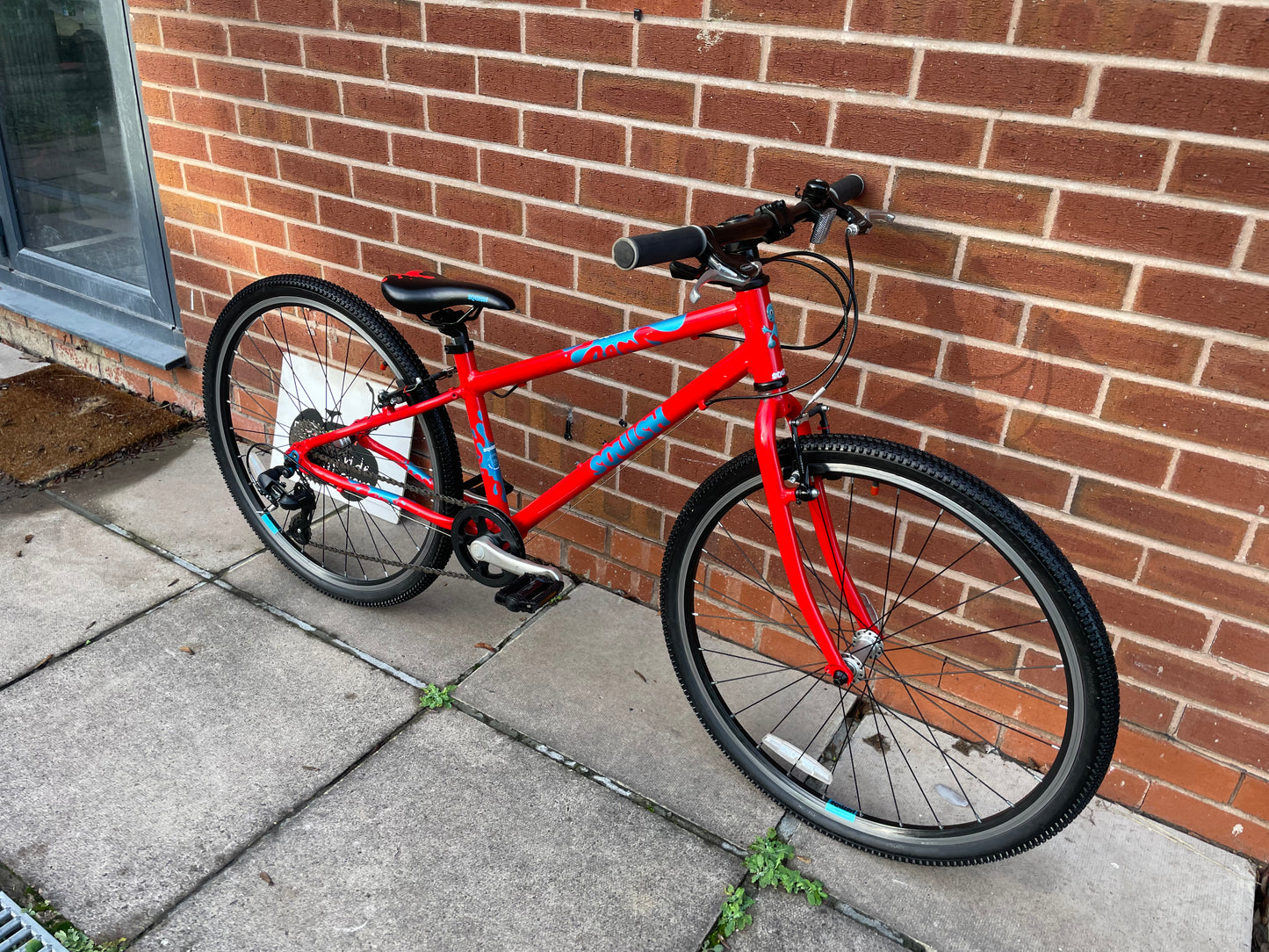 A Pre Loved Squish Bike For Sale, Red, 26” wheels, 8 speed, V brakes, very lightweight children’s bicycle, nationwide delivery is available.