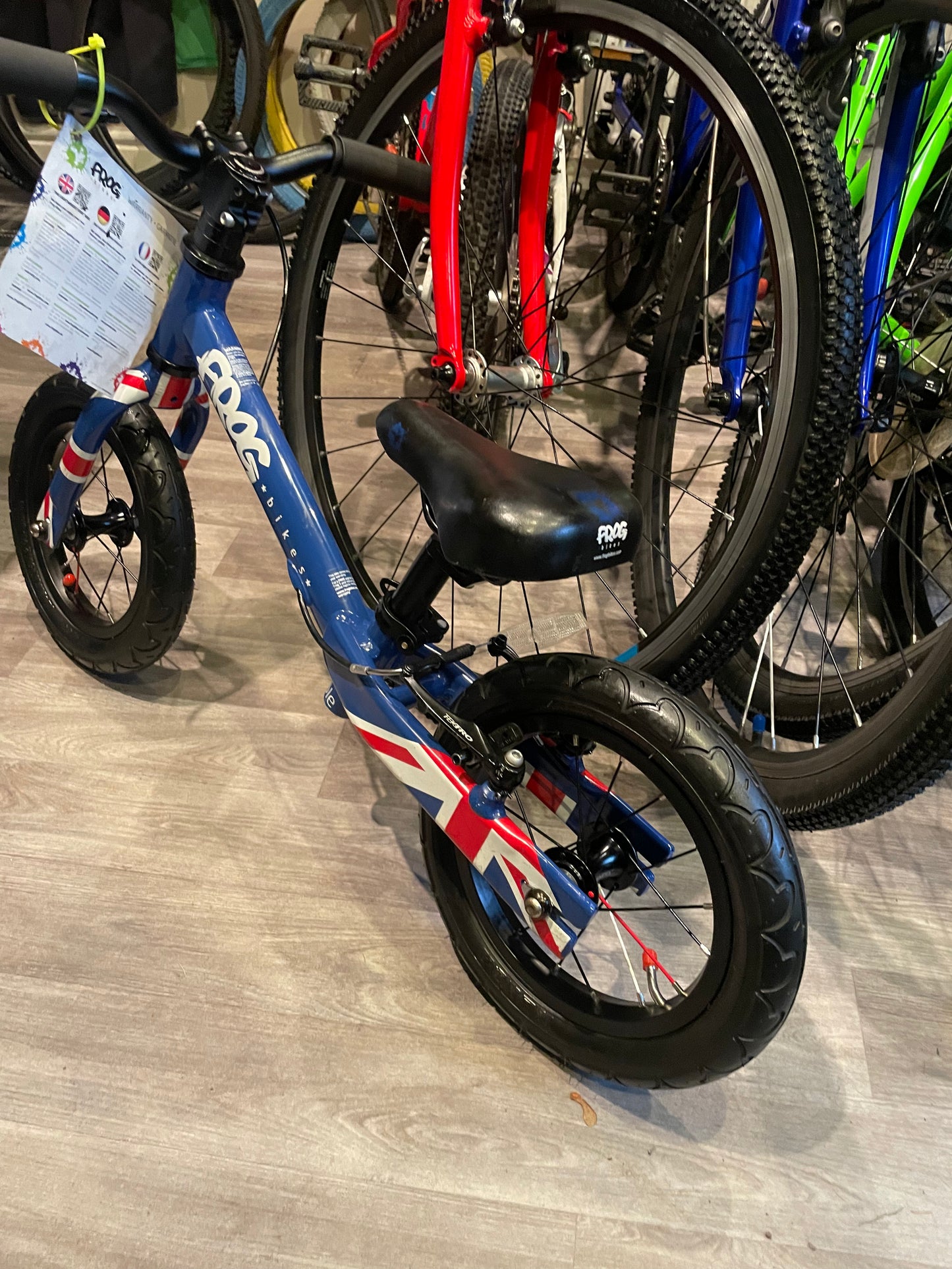 A Pre Loved Frog Bike For Sale, Blue Frog Tadpole Balance Bike, very lightweight, rear V brake, padded seat, excellent condition, nationwide delivery is available.