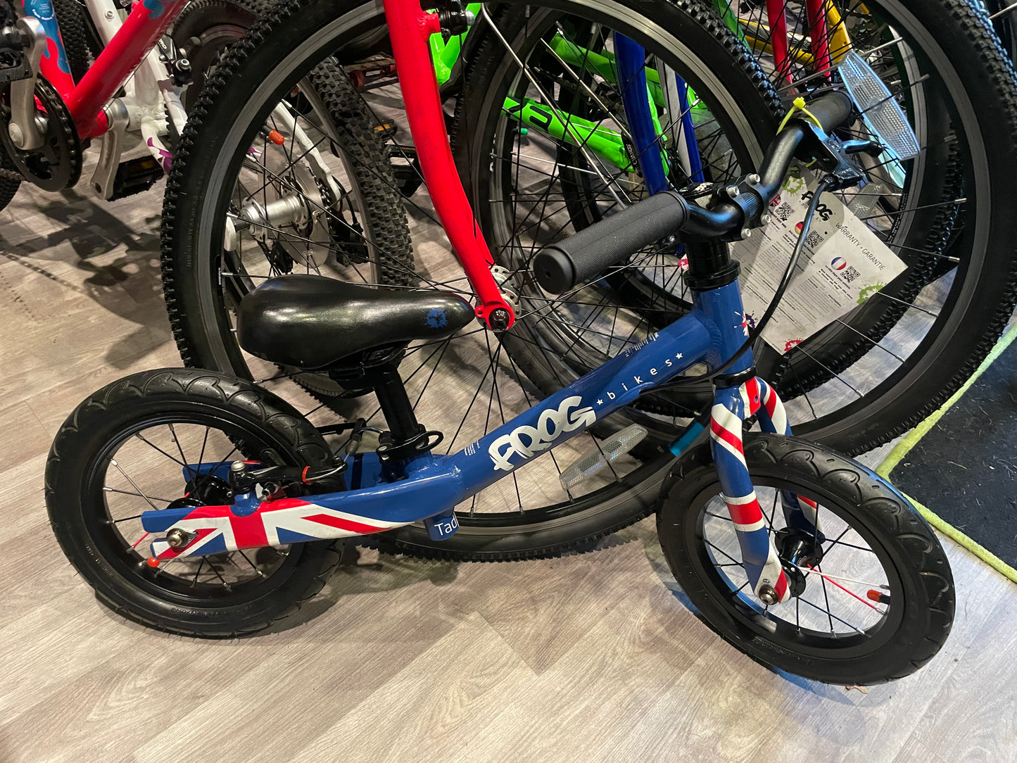 A Pre Loved Frog Bike For Sale, Blue Frog Tadpole Balance Bike, very lightweight, rear V brake, padded seat, excellent condition, nationwide delivery is available.