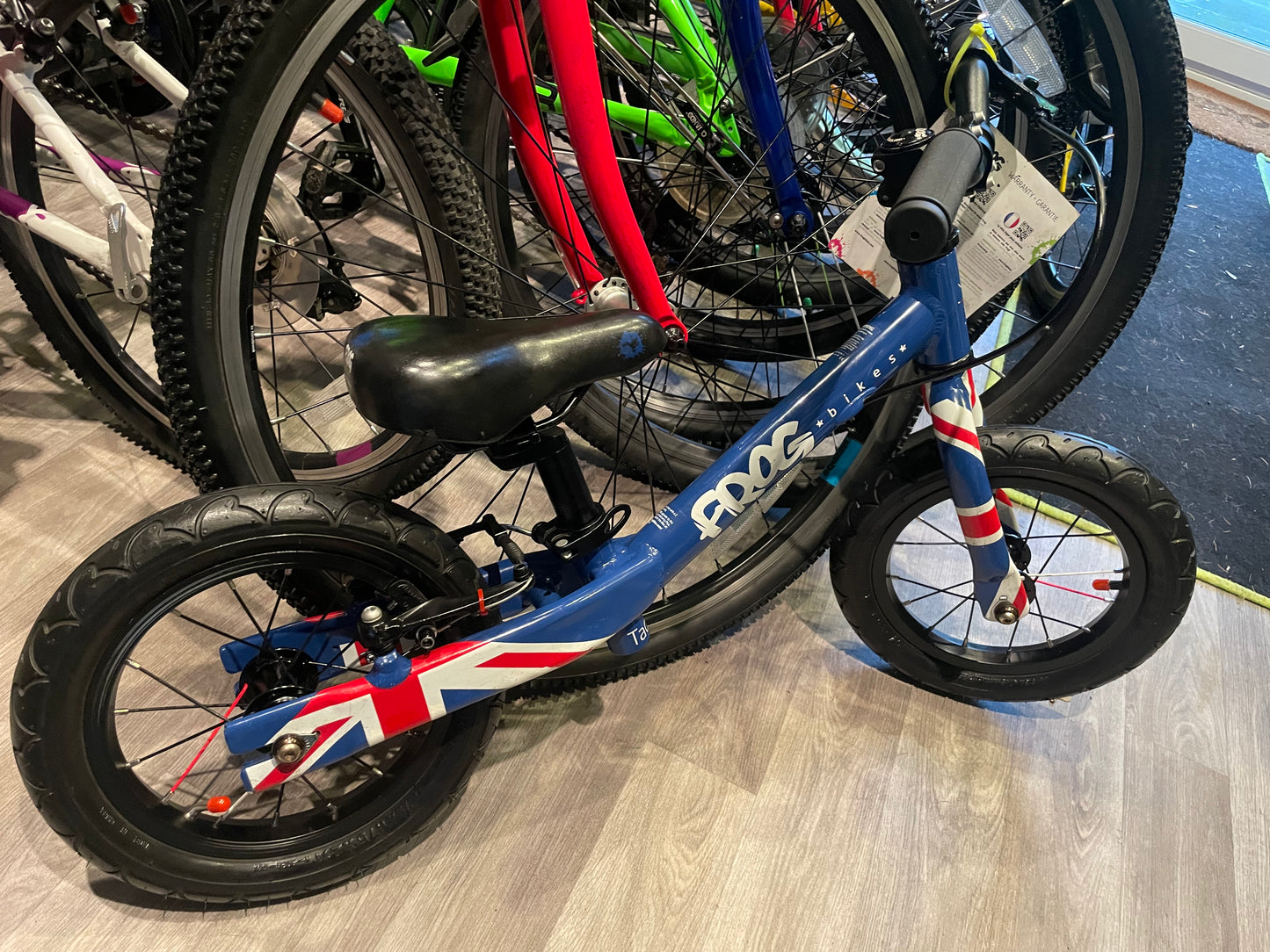 A Pre Loved Frog Bike For Sale, Blue Frog Tadpole Balance Bike, very lightweight, rear V brake, padded seat, excellent condition, nationwide delivery is available.