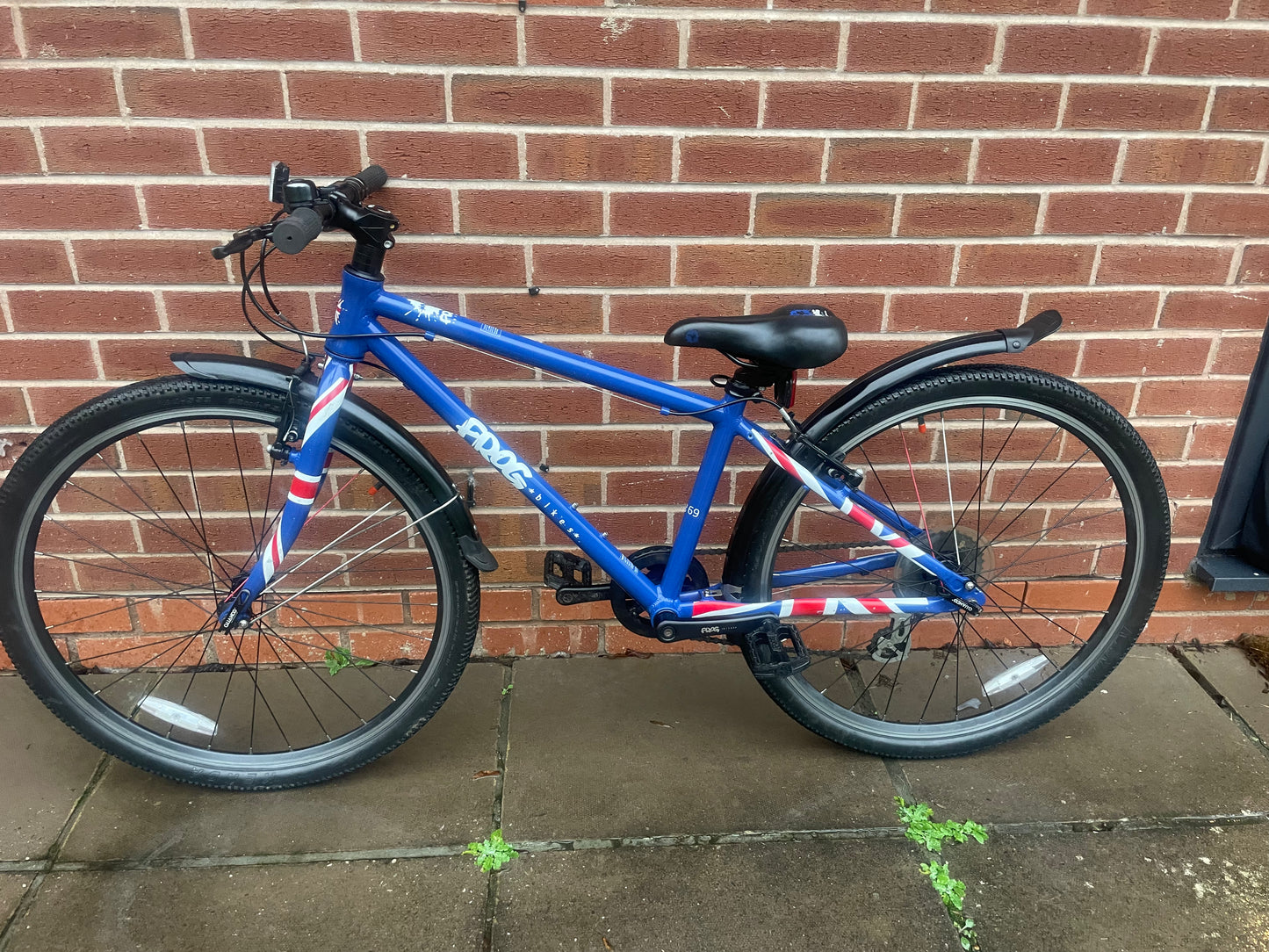 A Pre Loved Frog Bike For Sale, Blue Frog 69 26” wheel hybrid bicycle, 8 speed, V brakes, mudguards, very lightweight, nationwide delivery is available.