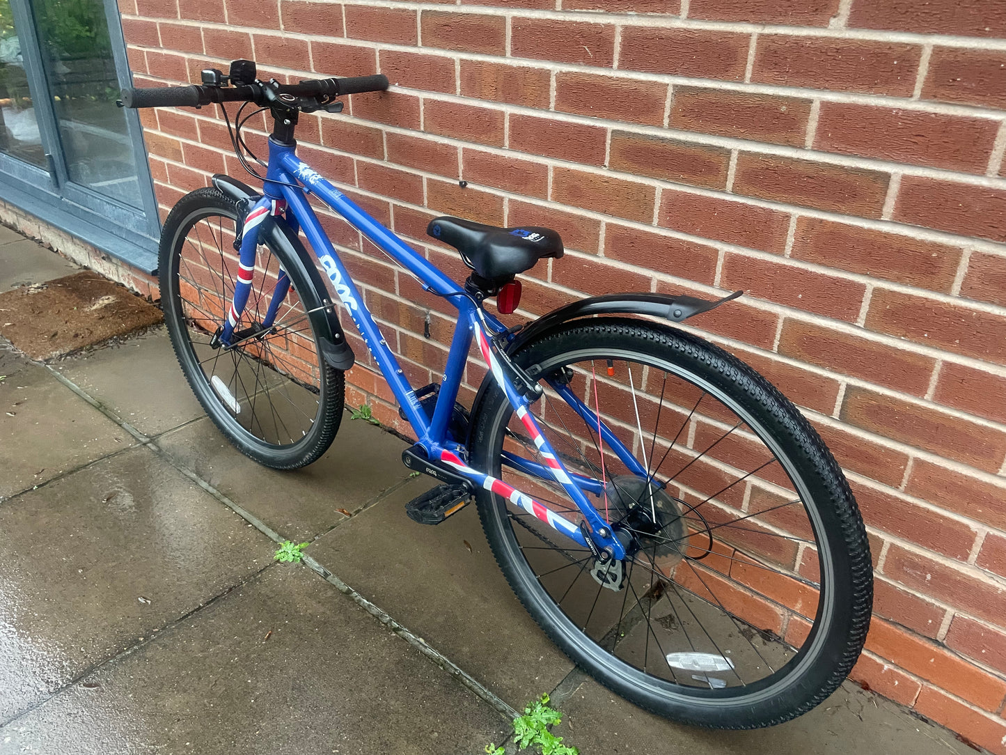 A Pre Loved Frog Bike For Sale, Blue Frog 69 26” wheel hybrid bicycle, 8 speed, V brakes, mudguards, very lightweight, nationwide delivery is available.