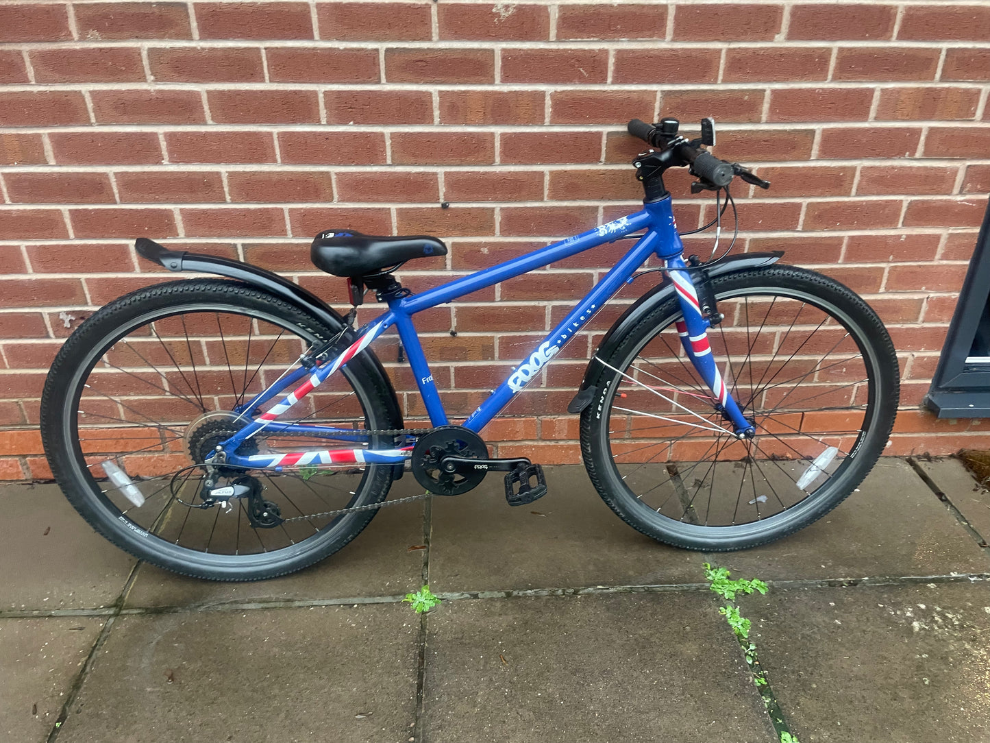 A Pre Loved Frog Bike For Sale, Blue Frog 69 26” wheel hybrid bicycle, 8 speed, V brakes, mudguards, very lightweight, nationwide delivery is available.