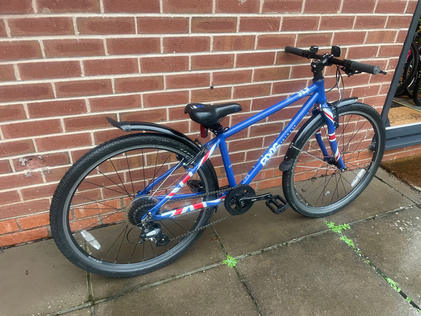A Pre Loved Frog Bike For Sale, Blue Frog 69 26” wheel hybrid bicycle, 8 speed, V brakes, mudguards, very lightweight, nationwide delivery is available.