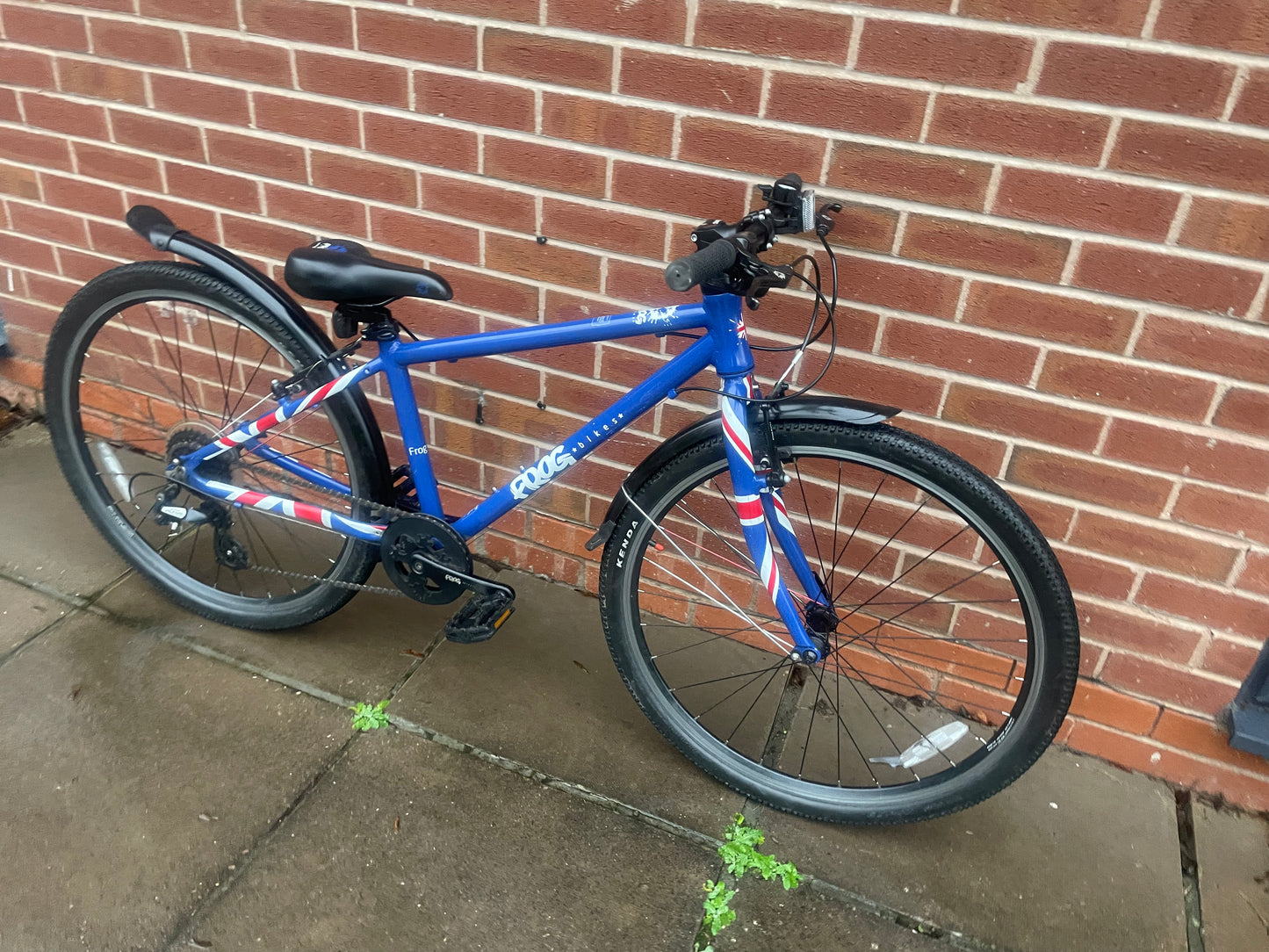 A Pre Loved Frog Bike For Sale, Blue Frog 69 26” wheel hybrid bicycle, 8 speed, V brakes, mudguards, very lightweight, nationwide delivery is available.