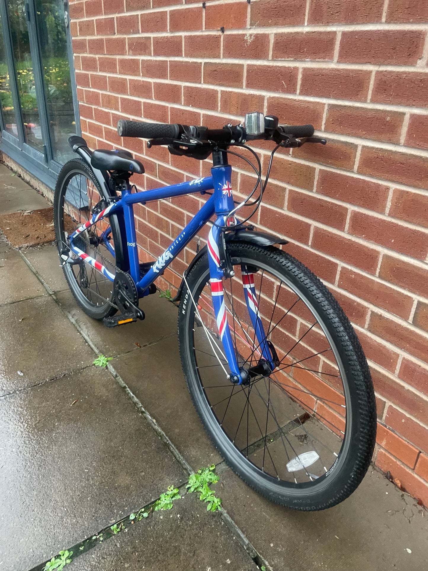 A Pre Loved Frog Bike For Sale, Blue Frog 69 26” wheel hybrid bicycle, 8 speed, V brakes, mudguards, very lightweight, nationwide delivery is available.