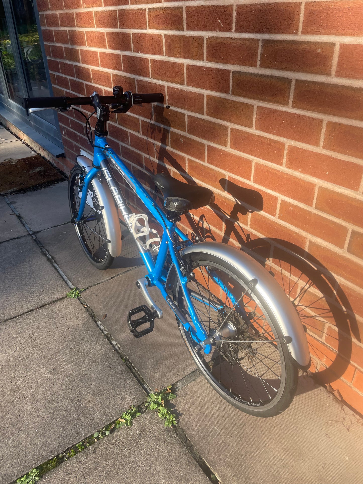 A Pre Loved Isla Bike For Sale, Blue Isla Cnoc 20L, 20” wheels, 8 speed, V brakes, mudguards, very lightweight, nationwide delivery is available.