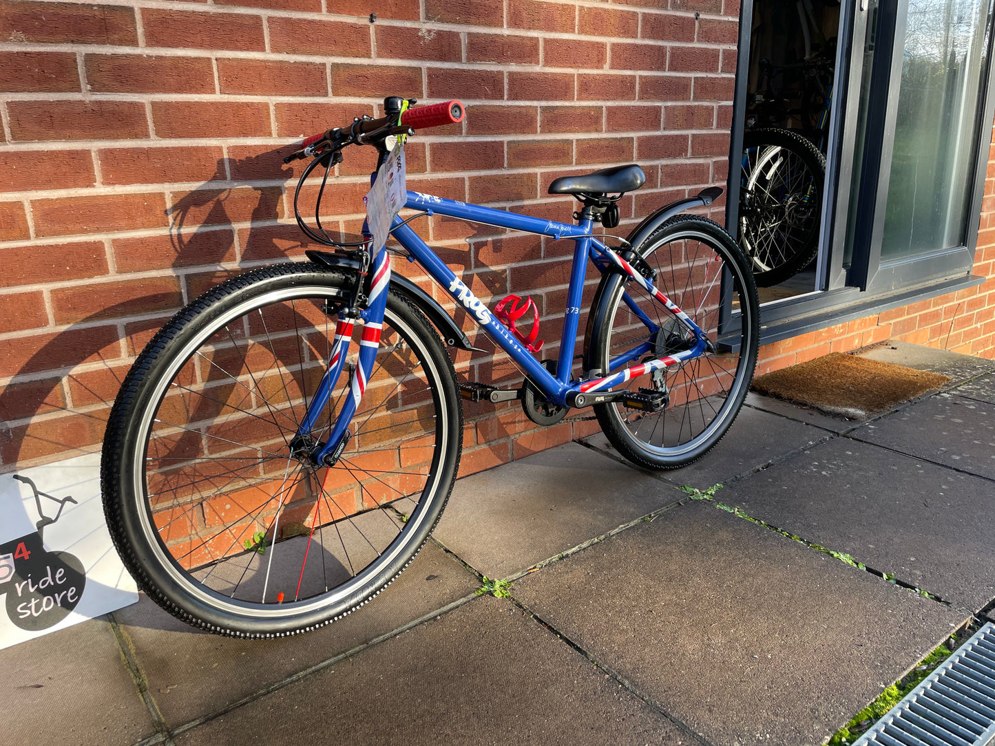 A Pre Loved Frog Bike For Sale, Frog 73 hybrid bicycle, 26” wheels, 8 speed, V brakes, mudguards, bottle cage, new grips, very lightweight, nationwide delivery is available.