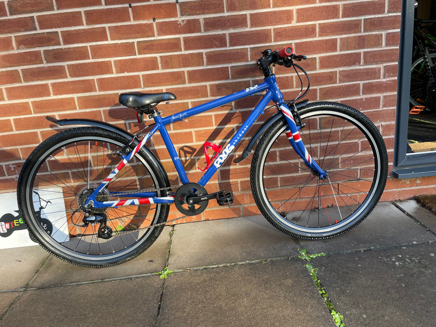 A Pre Loved Frog Bike For Sale, Frog 73 hybrid bicycle, 26” wheels, 8 speed, V brakes, mudguards, bottle cage, new grips, very lightweight, nationwide delivery is available.