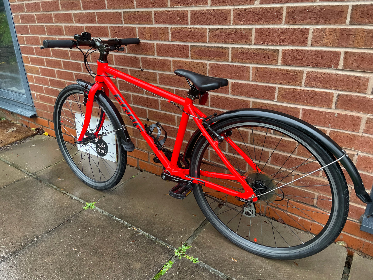 A Pre Loved Frog Bike For Sale Neon Red Frog 73, 26” wheels, 8 speed, V brakes, mudguards, bottle cage, very lightweight, nationwide delivery is available.