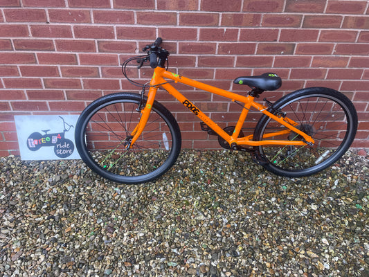 A Pre Loved Frog Bike For Sale, Orange Frog 62, 24” wheels, 8 speed, V brakes, very lightweight, nationwide delivery is available.