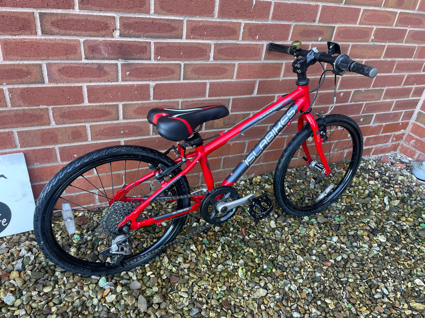 A Pre Loved Isla Bike For Sale, Red Isla Beinn 20S, 20” wheels, 8 speed, V brakes, very lightweight, nationwide delivery is available.